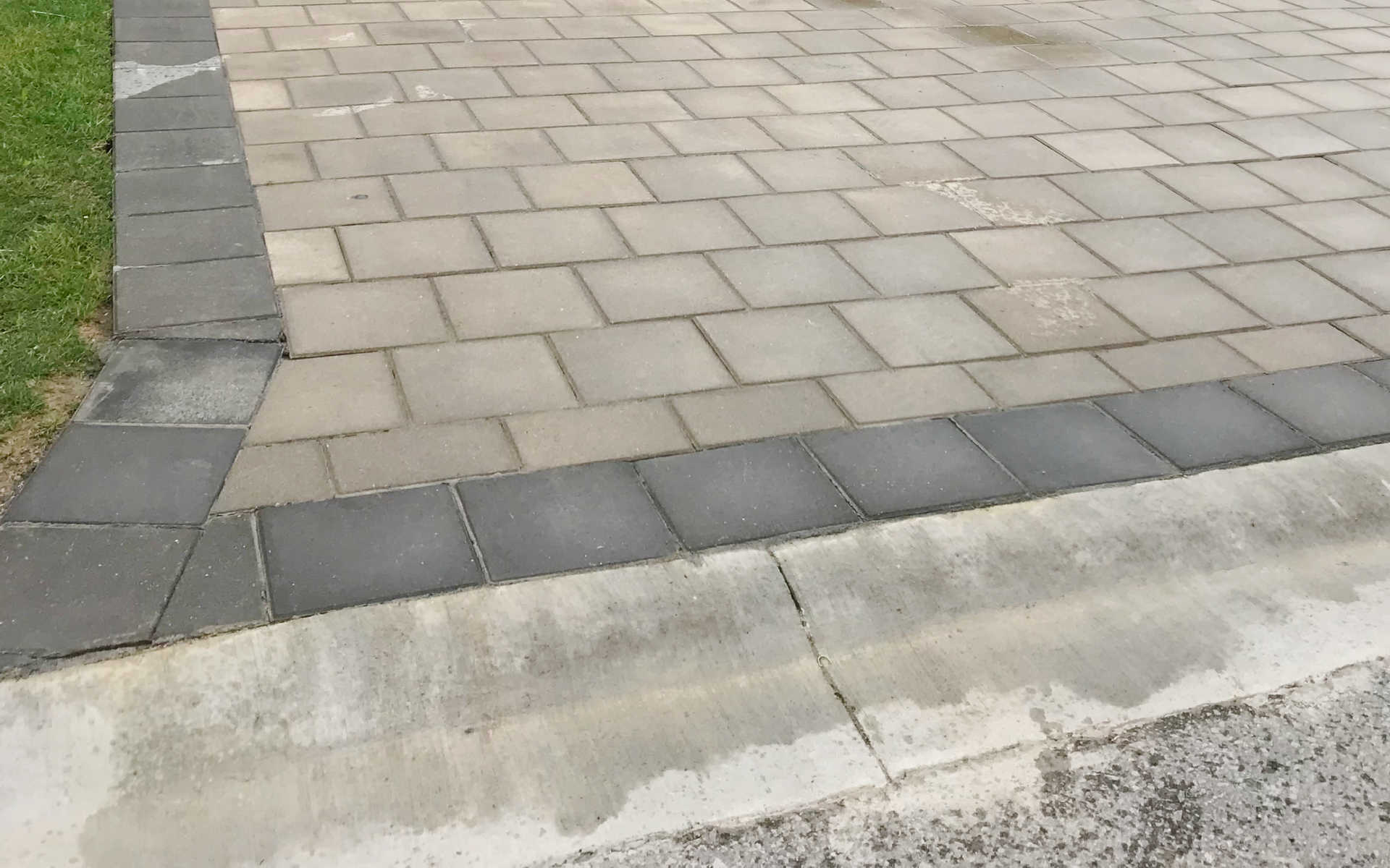 Interlocking Brick Driveway / Square Stone Pavers Driveway. A London Ontario home exterior renovation project by Brothers Construction 3 Inc.